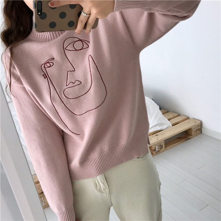 character embroidered sweater