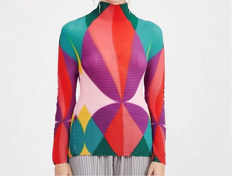 geometric pleated turtleneck blouse