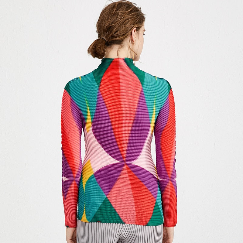 geometric pleated turtleneck blouse